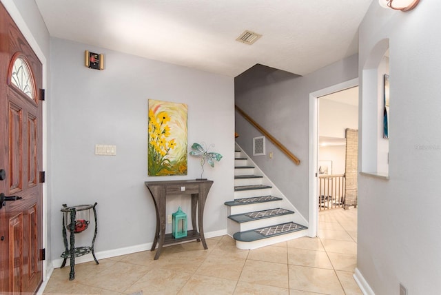 view of tiled foyer entrance