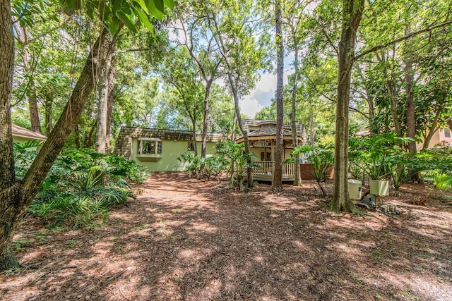 view of yard featuring a deck