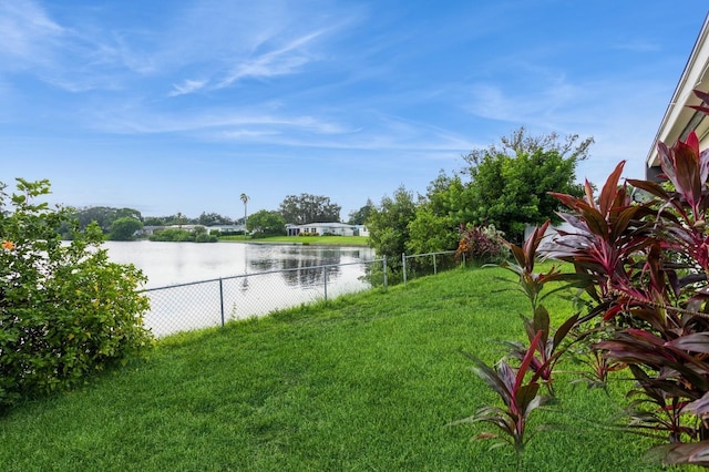 water view featuring fence