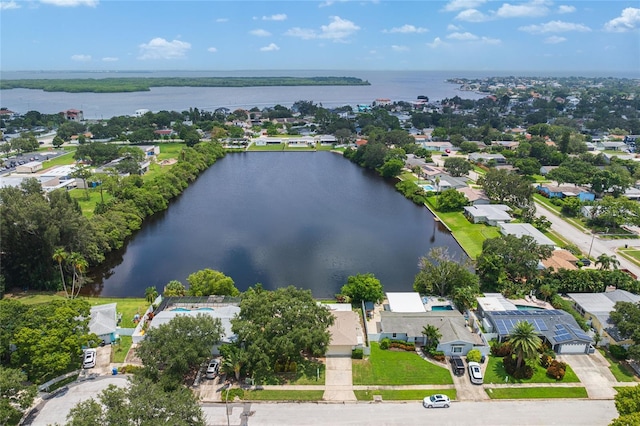 bird's eye view with a water view