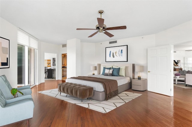 bedroom featuring hardwood / wood-style flooring and ceiling fan