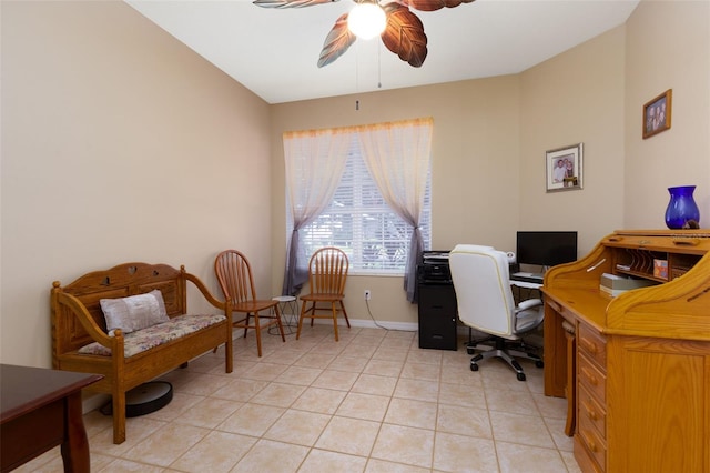 tiled office space featuring ceiling fan