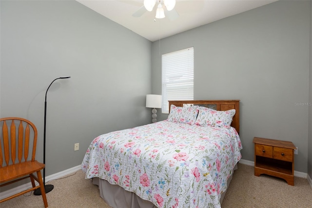 bedroom with light colored carpet and ceiling fan