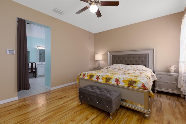 bedroom featuring ceiling fan and light hardwood / wood-style floors