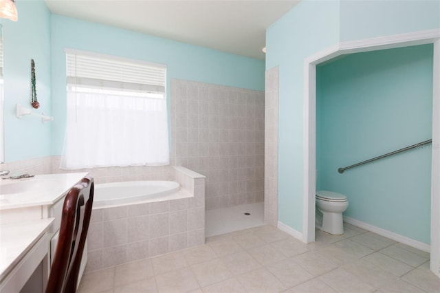 full bathroom featuring a healthy amount of sunlight, tile patterned floors, toilet, and vanity