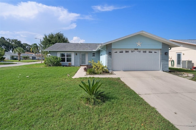 single story home featuring a front lawn, central AC unit, and a garage