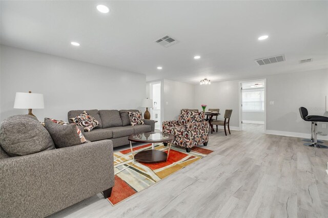 living room featuring light wood-type flooring