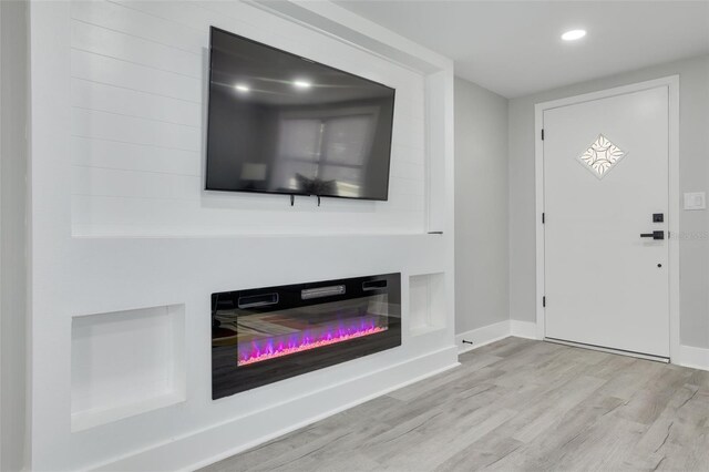 foyer entrance featuring light wood-type flooring