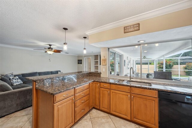 kitchen with sink, black dishwasher, a textured ceiling, and ceiling fan