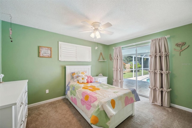 carpeted bedroom featuring a textured ceiling, ceiling fan, and access to exterior