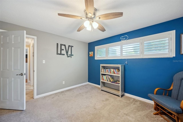 unfurnished room featuring light colored carpet, a wealth of natural light, and ceiling fan