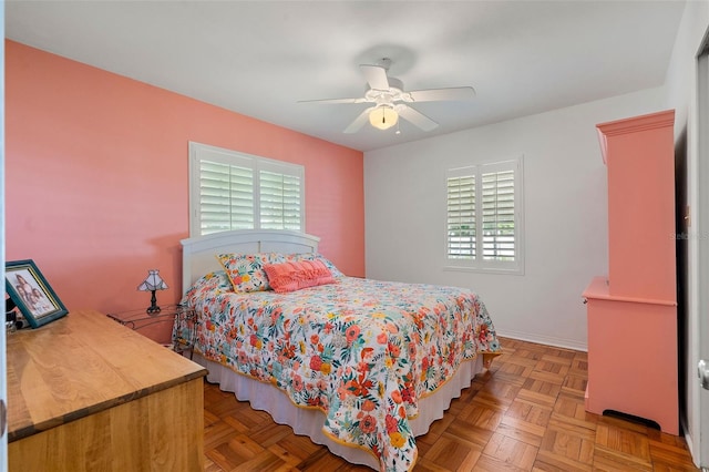 bedroom featuring light parquet floors and ceiling fan