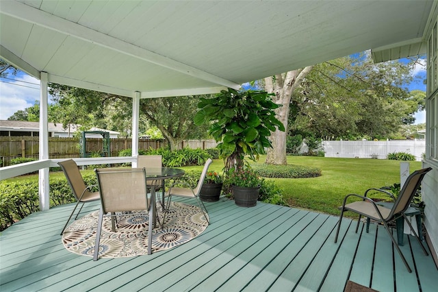 deck featuring a lawn