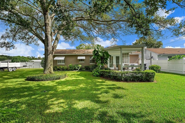 exterior space with a lawn