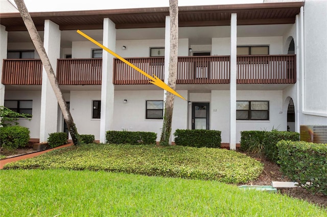 view of property with central AC unit