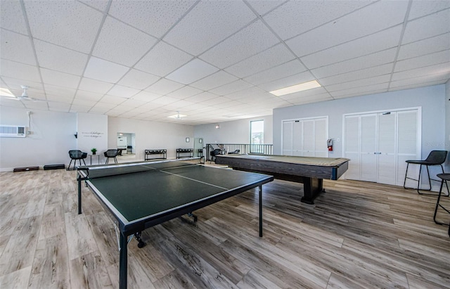 playroom featuring a paneled ceiling, light hardwood / wood-style floors, and billiards