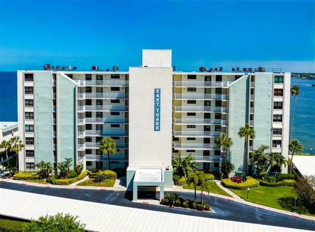 300 Woodette Dr Unit 202B, Dunedin, FL 34698 - view of apartment building / complex featuring a water view