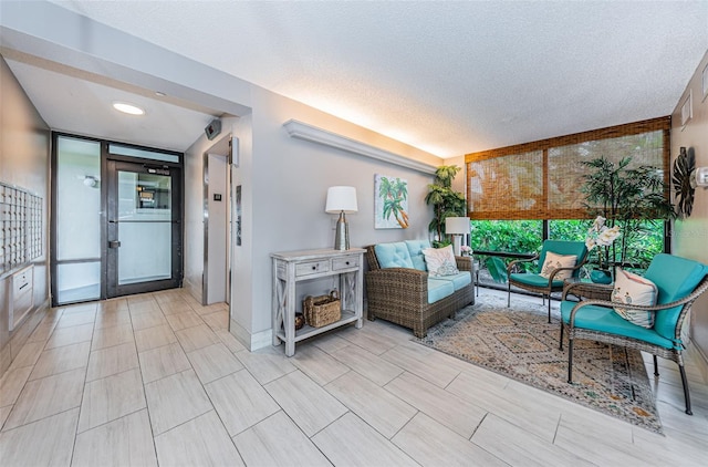 300 Woodette Dr Unit 202B, Dunedin, FL 34698 - lobby featuring a textured ceiling