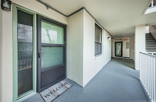 300 Woodette Dr Unit 202B, Dunedin, FL 34698 - entrance to property featuring stucco siding