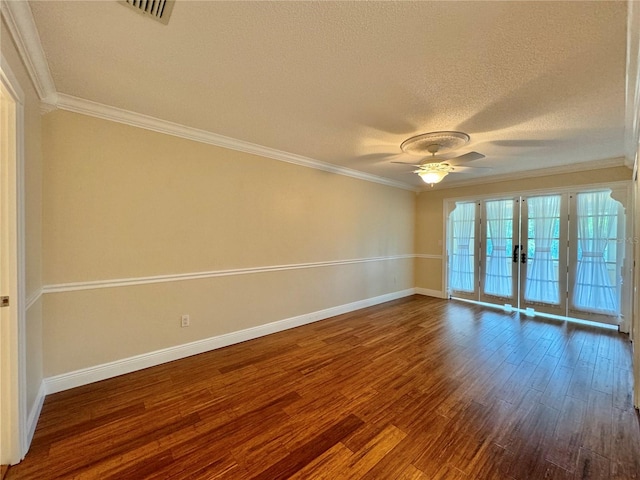 spare room featuring ornamental molding, french doors, a textured ceiling, ceiling fan, and hardwood / wood-style flooring