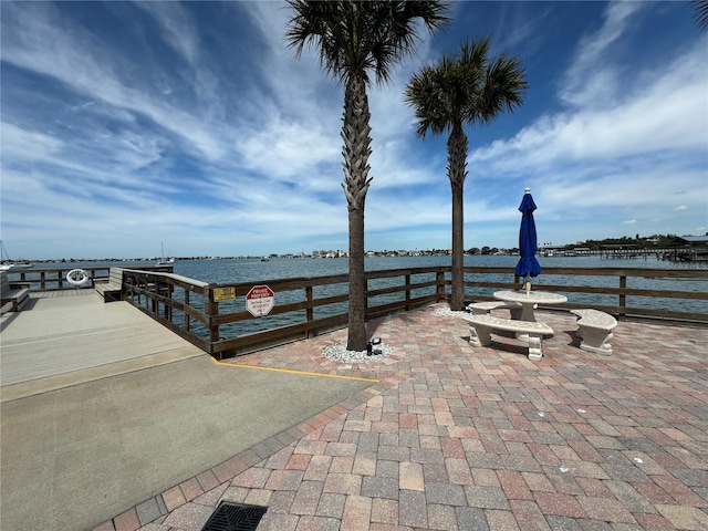 view of patio featuring a water view