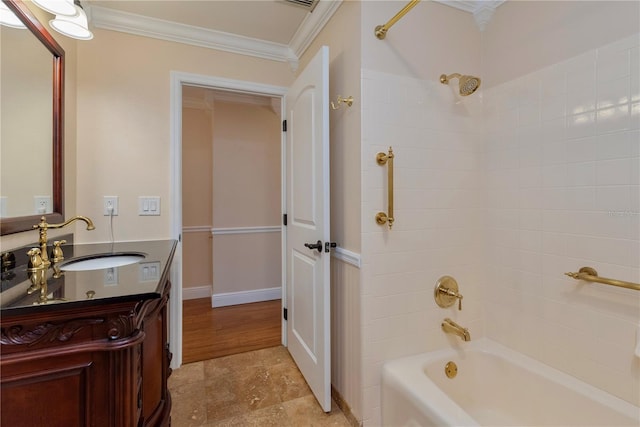 bathroom featuring shower / bathing tub combination, crown molding, vanity, and hardwood / wood-style floors