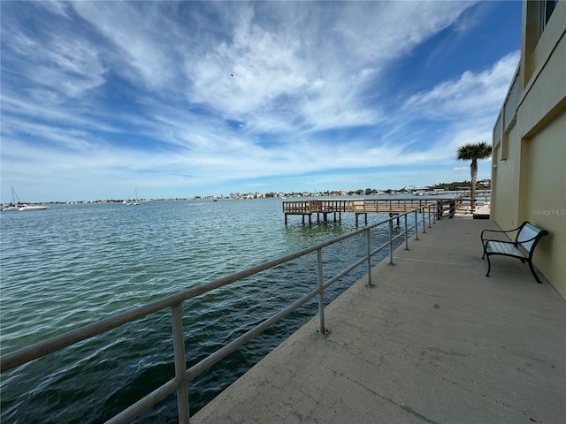 dock area featuring a water view