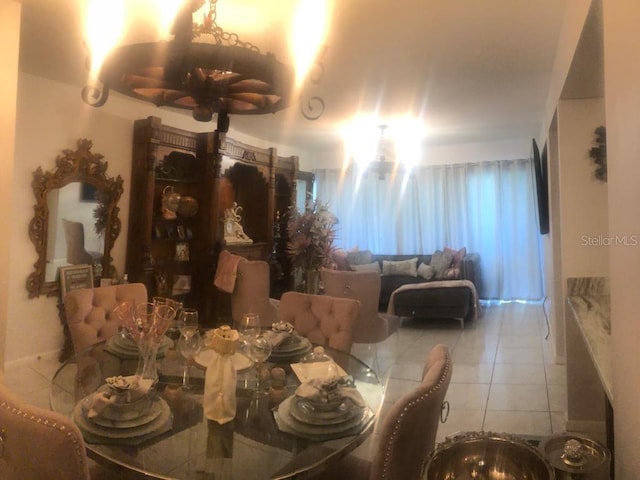 dining space featuring tile patterned floors