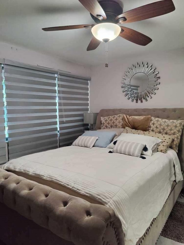 bedroom featuring ceiling fan