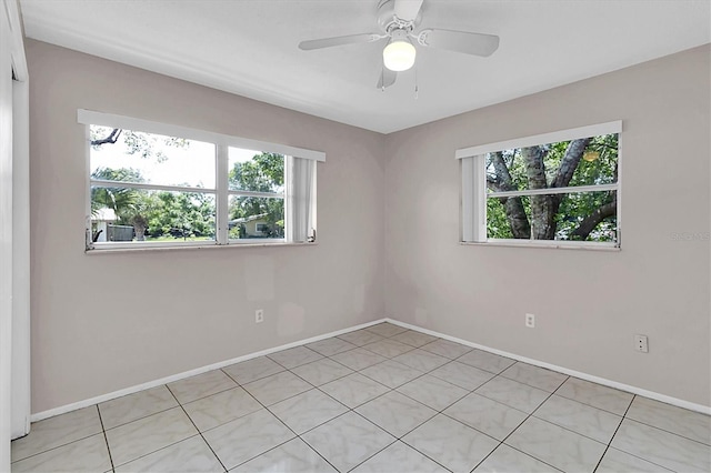 empty room featuring ceiling fan