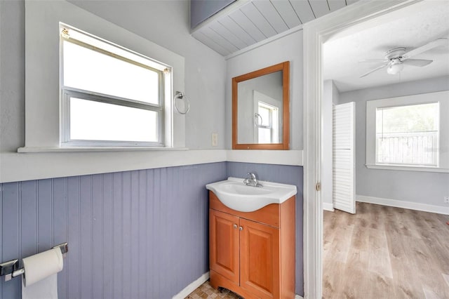 bathroom with wooden ceiling, vaulted ceiling, hardwood / wood-style floors, ceiling fan, and vanity