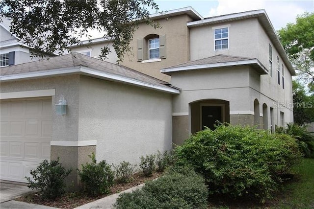 exterior space featuring a garage