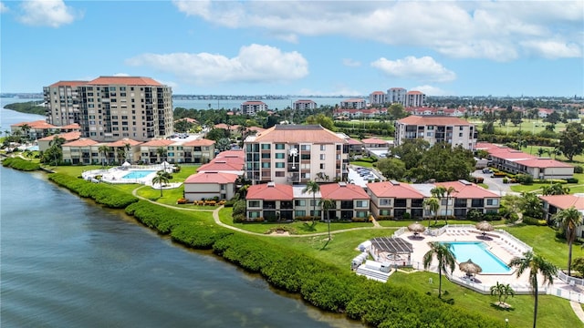 bird's eye view with a water view