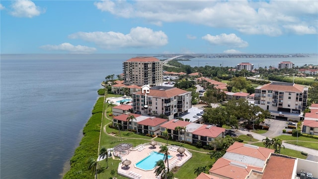 birds eye view of property featuring a water view