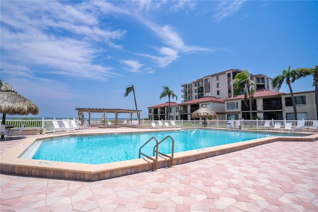 view of pool featuring a pergola and a patio area