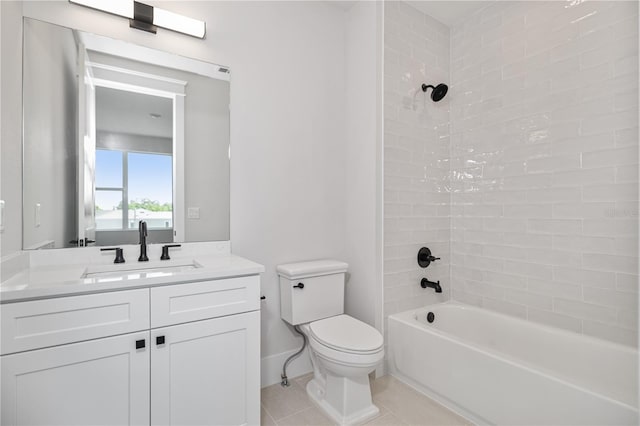 full bathroom with tiled shower / bath combo, vanity, toilet, and tile patterned floors