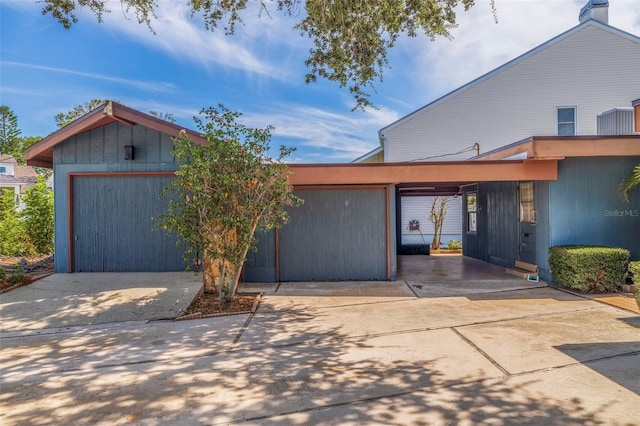 view of front of property with a carport