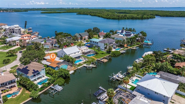 drone / aerial view with a water view