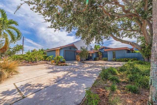 ranch-style home with a garage