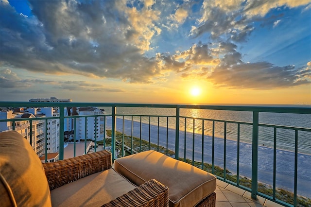 balcony at dusk with a water view