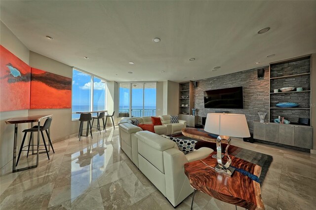 tiled living room with a fireplace and built in shelves