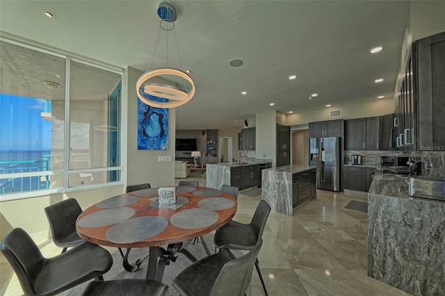 tiled dining area with sink