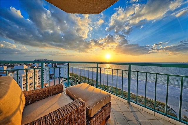 balcony at dusk with a water view