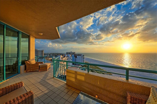 balcony at dusk with a water view