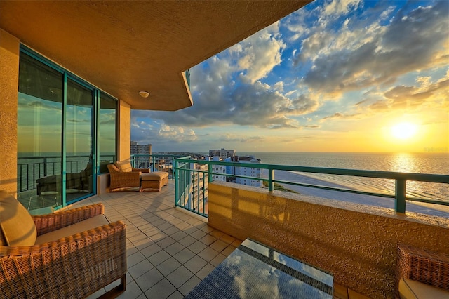 balcony at dusk with a water view