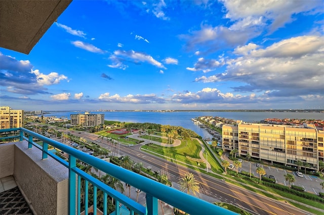 balcony featuring a water view