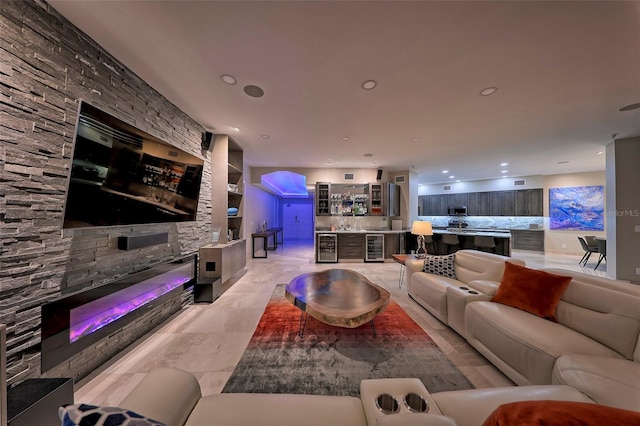 living room with wine cooler and light tile patterned floors