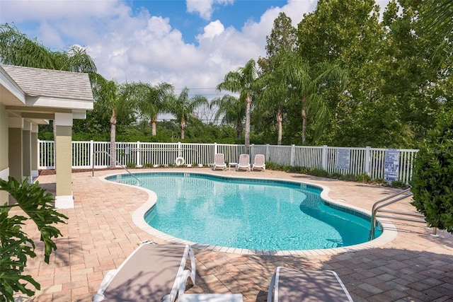 view of swimming pool featuring a patio