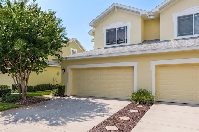 view of property featuring a garage