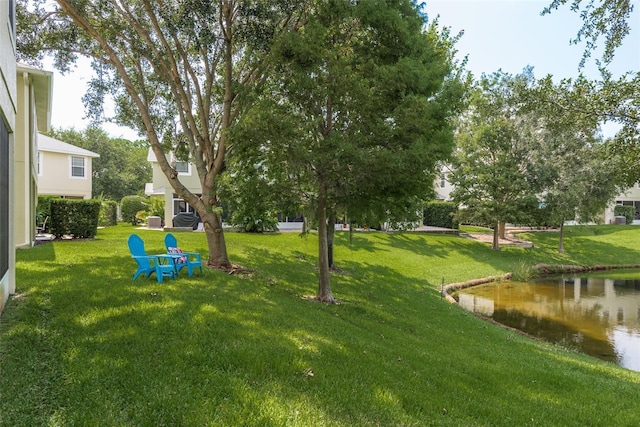 view of yard with a water view